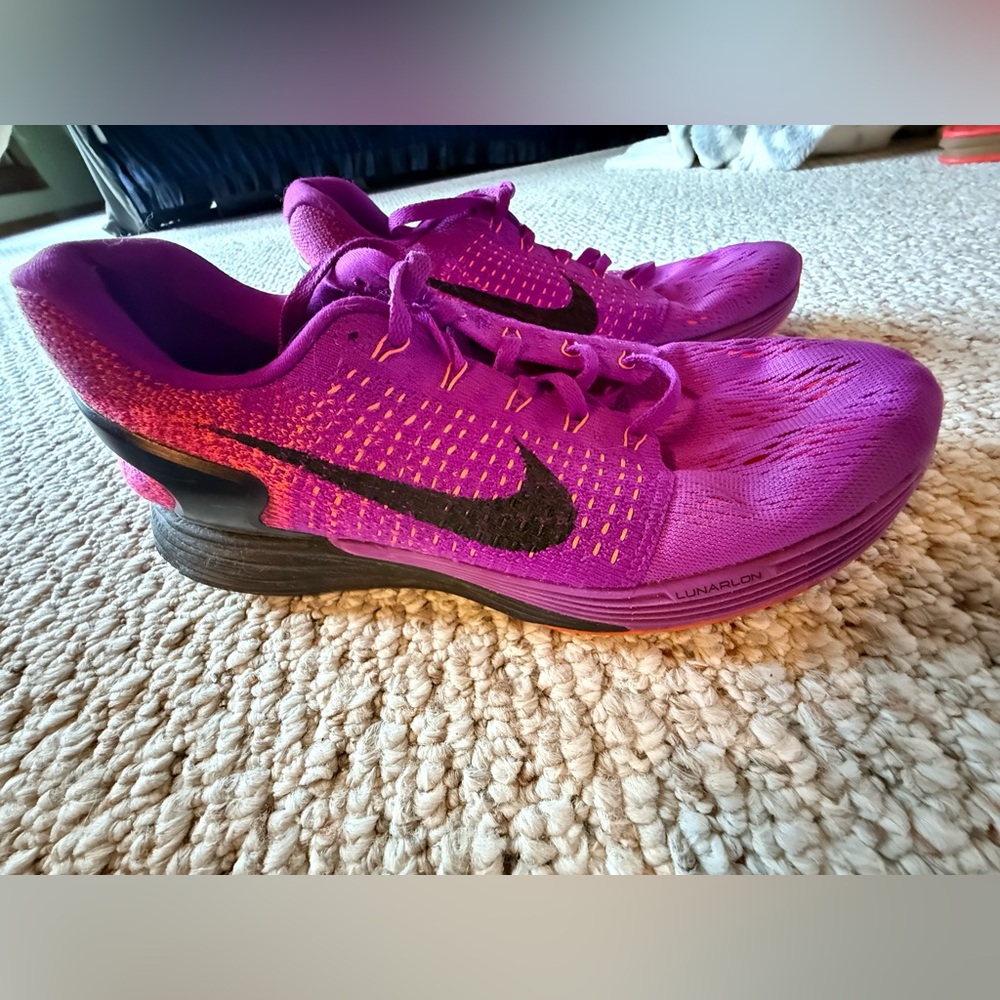 Nike Women's Purple/Pink Athletic Running Shoes with Black Swoosh